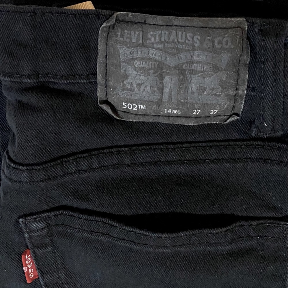 Boys Levi 502 black jeans 27x27
